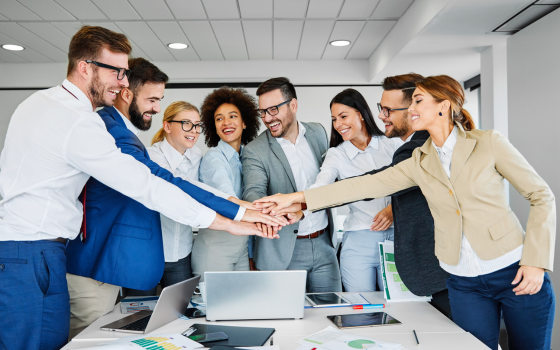 team of business people celebrating success